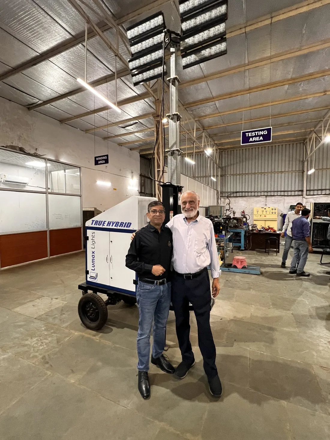 Kunwer Sachdev with Mr. Deepak Singh at the Su-Kam testing area