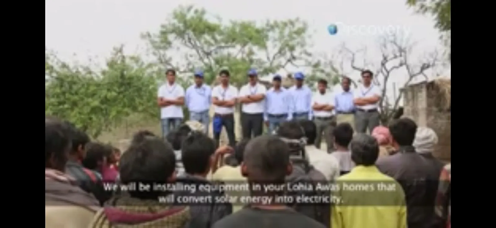 Su-Kam team explaining solar to a village gathering during the Sun Fuel feature