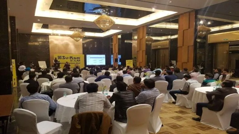 A Su-Kam Solar dealer meet in progress, with distributors seated for a product presentation