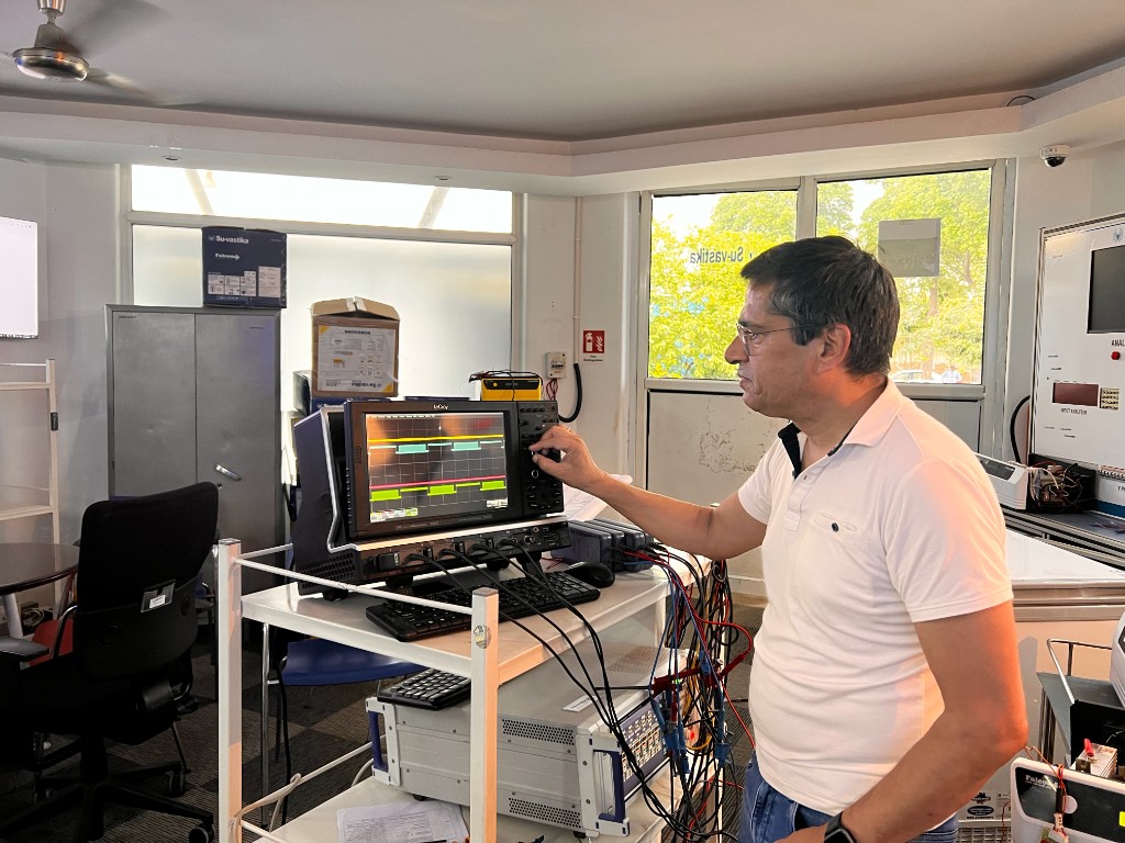 Kunwer Sachdev at the test bench — the factory-floor instinct that outranked polished interviews